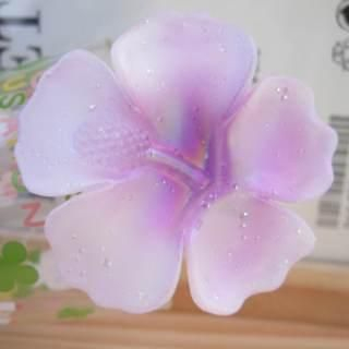 Purple Hawaii 's flower with water drops hair pin Purple Hawaii 's flower with water drops hair pin