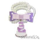 Sweet & Co. - Sweet Purple polka dots bow dolly cake charm pearly bracelet