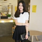 LORIKEET - Contrast-Collar Zip-Back Top