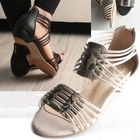 Marcella - Snake-Print Flat Sandals