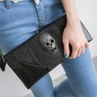 CatWorld - Skull-Accent Croc-Grain Clutch