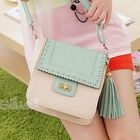 PG Beauty - Tassel-Accent Perforated Crossbody Bag