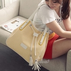PG Beauty - Tassel-Accent Striped Shoulder Bag
